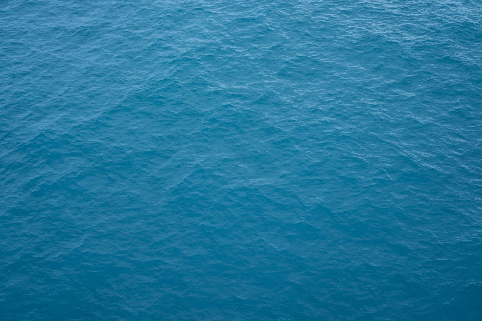 Rippling blue ocean water surface