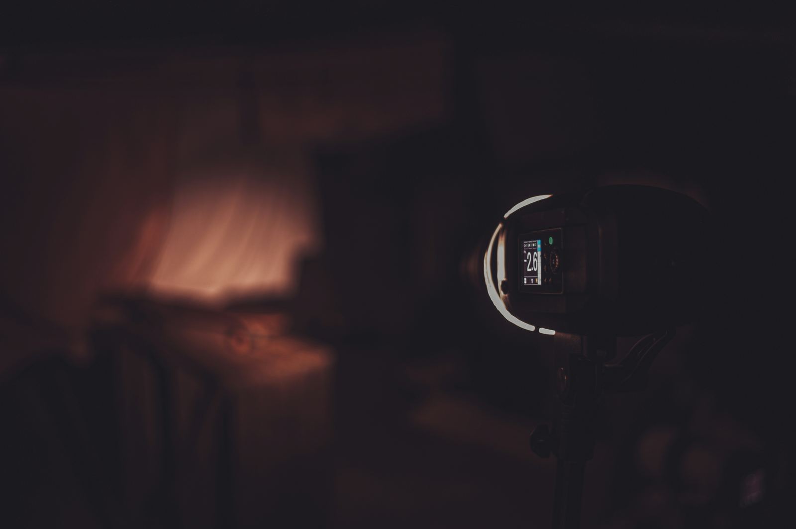Close-up of a video camera viewfinder in a dark studio
